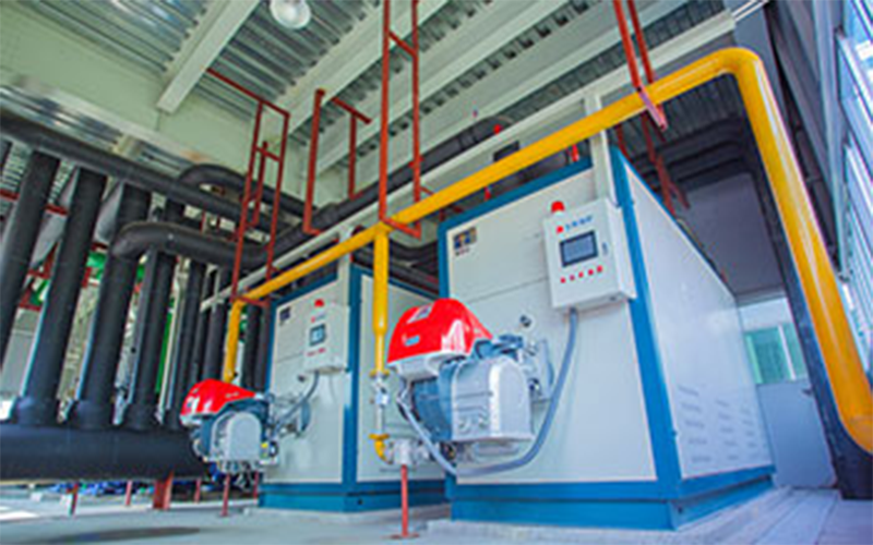 What are the performance advantages of industrial fire tube boilers?